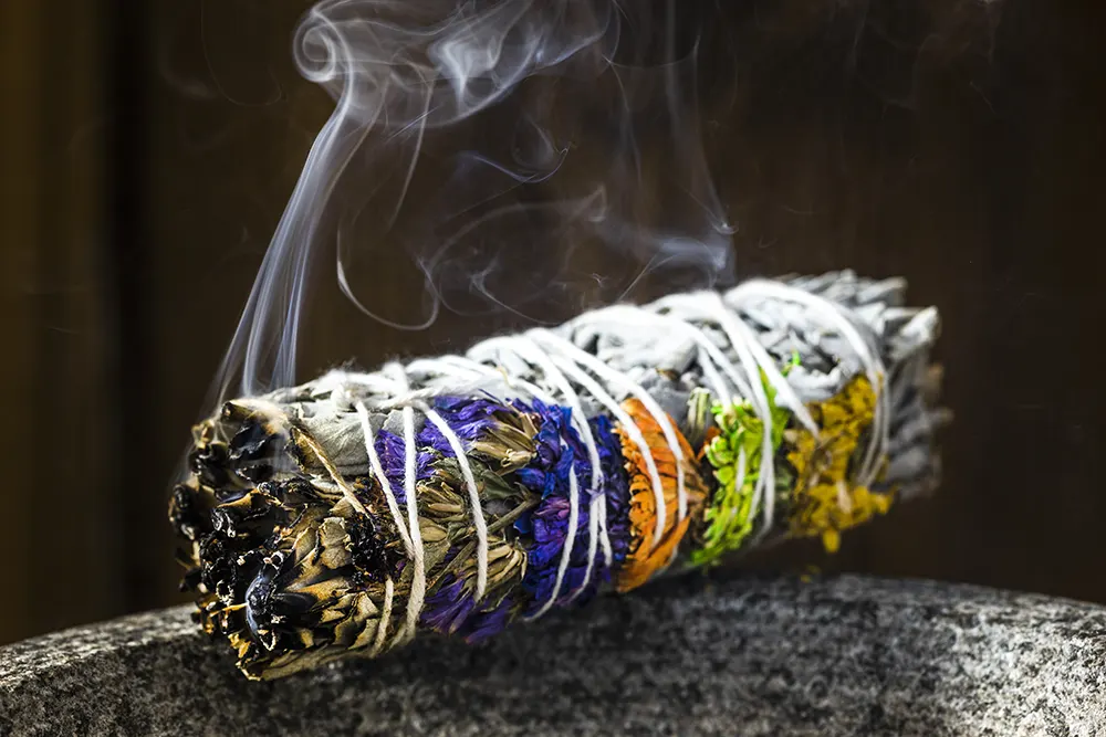 Smudge burning sage incense