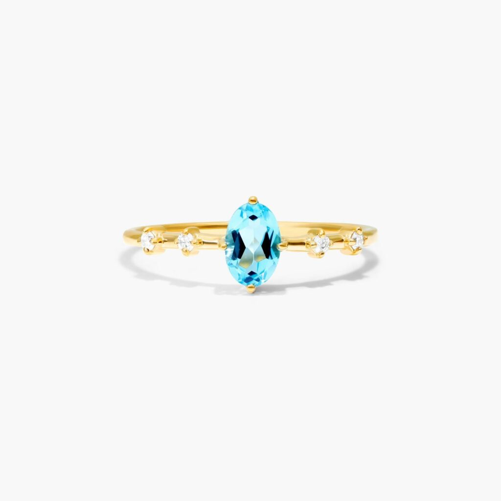 14K Yellow Gold Oval Blue Topaz and Diamond Birthstone Ring 1